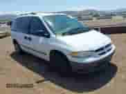 1999 Dodge Caravan z VIN 2B4FP2534XR161940, wystawiony jako IAAI lot #41974872 z przebiegiem 162 035 mil mil oraz . Historia ofert i sprzedaży dostępna na DreamBid. Obrazek 1.