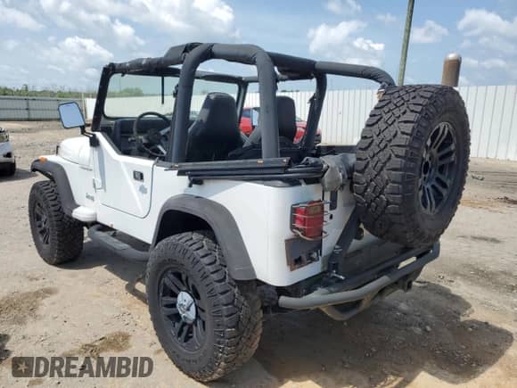 1993 Jeep Wrangler S z VIN 1J4FY19P7PP228002, wystawiony jako Copart lot #60000135 z przebiegiem 137 858 mil mil oraz Czysty tytuł • Clean title. Historia ofert i sprzedaży dostępna na DreamBid. Obrazek 2.