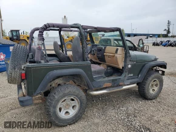 1998 Jeep Wrangler SE z VIN 1J4FY29P1WP763752, wystawiony jako Copart lot #70510885 z przebiegiem 228 480 mil mil oraz Szkoda całkowita • Salvage title. Historia ofert i sprzedaży dostępna na DreamBid. Obrazek 3.