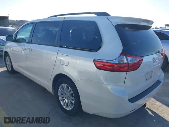 2016 Toyota Sienna XLE with VIN 5TDYK3DC6GS758189, listed as a IAAI auction lot 41598251 with 129,050 mi miles and . Bid and sale history available at DreamBid. Image 3.