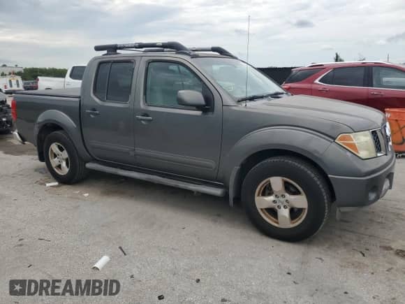 2006 Nissan Frontier LE с VIN 1N6AD07U56C470935, выставлен на аукционе Copart как лот 70173915 с пробегом 205 614 миль миль и Списание • Salvage title. История ставок и продаж доступна на DreamBid. Изображение 4.