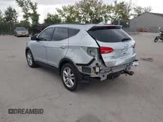 2016 Hyundai Santa Fe z VIN 5XYZWDLA1GG305495, wystawiony jako IAAI lot #43161342 z przebiegiem 121 262 mil mil oraz . Historia ofert i sprzedaży dostępna na DreamBid. Obrazek 3.