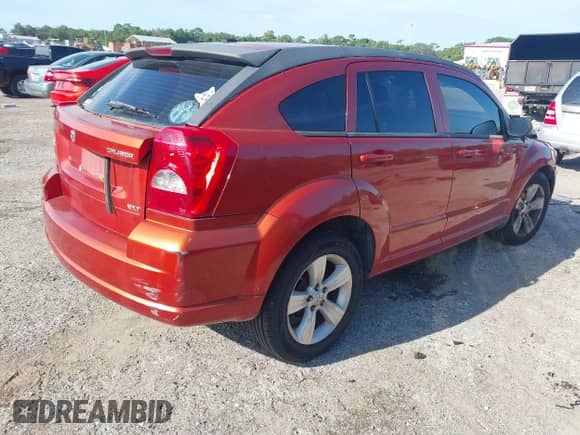 2010 Dodge Caliber SXT with VIN 1B3CB4HA4AD632362, listed as a IAAI auction lot 43130784 with 192,276 mi miles and . Bid and sale history available at DreamBid. Image 4.