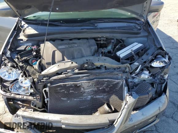 2007 Honda Odyssey EX z VIN 5FNRL384X7B103283, wystawiony jako Copart lot #69881675 z przebiegiem Nie podano mil oraz Szkoda całkowita • Salvage title. Historia ofert i sprzedaży dostępna na DreamBid. Obrazek 12.