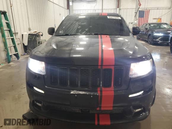 2012 Jeep Grand Cherokee SRT-8 z VIN 1C4RJFDJ9CC153408, wystawiony jako Copart lot #55477035 z przebiegiem 106 239 mil mil oraz Czysty tytuł • Clean title. Historia ofert i sprzedaży dostępna na DreamBid. Obrazek 5.