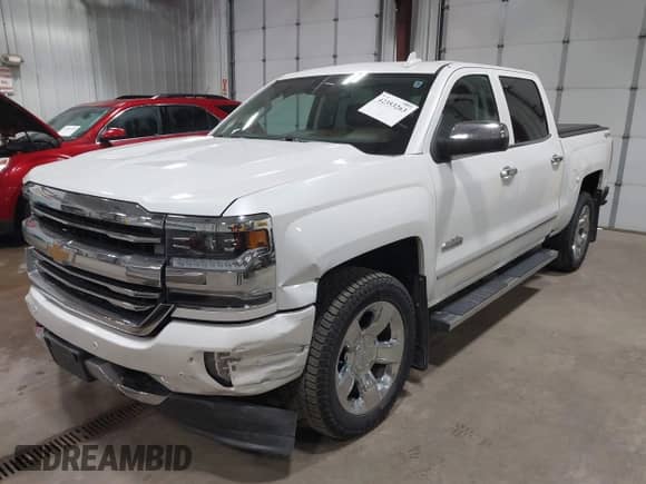 2017 Chevrolet Silverado 1500 High Country z VIN 3GCUKTEC1HG112099, wystawiony jako IAAI lot #42353263 z przebiegiem 81 415 mil mil oraz . Historia ofert i sprzedaży dostępna na DreamBid. Obrazek 19.