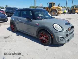 2016 MINI Hardtop John Cooper Works with VIN WMWXM9C58GT996815, listed as a IAAI auction lot 41756661 with 146,450 mi miles and . Bid and sale history available at DreamBid. Image 1.
