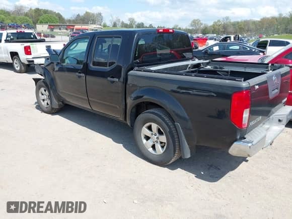 2010 Nissan Frontier Pro-4X with VIN 1N6AD0EV6AC438063, listed as a IAAI auction lot 41957316 with 219,181 mi miles and . Bid and sale history available at DreamBid. Image 3.