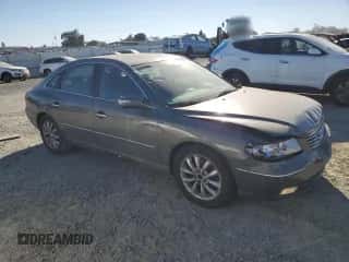 2007 Hyundai Azera SE с VIN KMHFC46F97A182589, выставлен на аукционе Copart как лот 73969184 с пробегом 108 731 миль миль и Списание • Salvage title. История ставок и продаж доступна на DreamBid. Изображение 4.