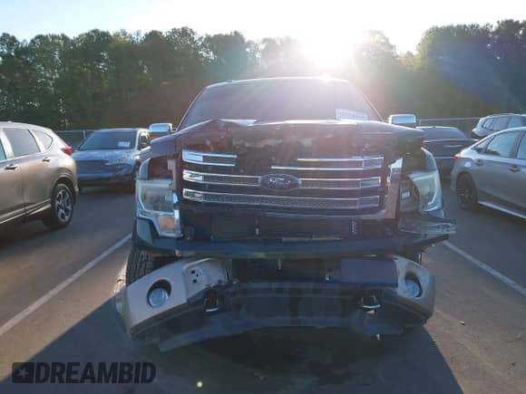 2013 Ford F-150 XL with VIN 1FTFW1EF9DKE08938, listed as a IAAI auction lot 43392604 with 166,881 mi miles and . Bid and sale history available at DreamBid. Image 13.