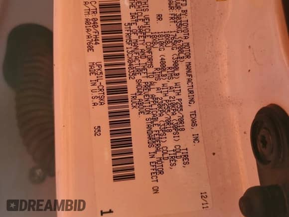 2012 Toyota Tundra z VIN 5TFRM5F13CX040352, wystawiony jako Copart lot #82679795 z przebiegiem 131 423 mil mil oraz Szkoda całkowita • Salvage title. Historia ofert i sprzedaży dostępna na DreamBid. Obrazek 12.