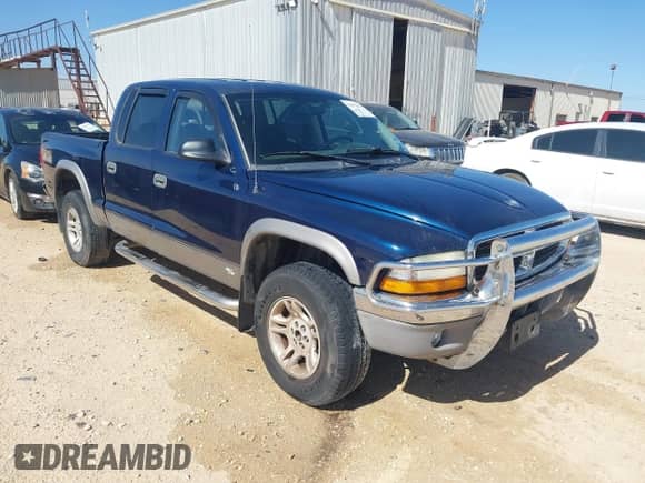 2003 Dodge Dakota SLT с VIN 1D7HG48N23S200916, выставлен на аукционе IAAI как лот 41672271 с пробегом 193 552 миль миль и . История ставок и продаж доступна на DreamBid. Изображение 1.