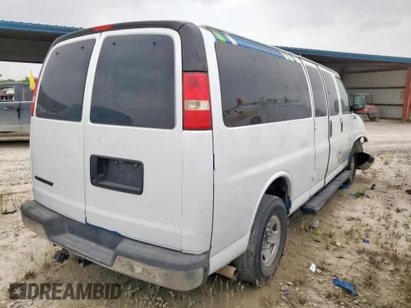 2013 Chevrolet Express Passenger LT z VIN 1GAZG1FG0D1167528, wystawiony jako Copart lot #53741965 z przebiegiem 103 253 mil mil oraz Szkoda całkowita • Salvage title. Historia ofert i sprzedaży dostępna na DreamBid. Obrazek 3.
