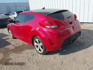 2014 Hyundai Veloster with VIN KMHTC6AD3EU199372, listed as a IAAI auction lot 43236218 with 145,635 mi miles and . Bid and sale history available at DreamBid. Image 3.