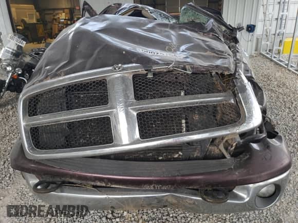 2005 Dodge 2500 SLT z VIN 3D7KS28C85G860976, wystawiony jako Copart lot #68625754 z przebiegiem Nie podano mil oraz Szkoda całkowita • Salvage title. Historia ofert i sprzedaży dostępna na DreamBid. Obrazek 11.