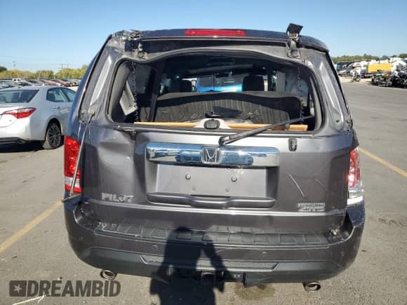 2015 Honda Pilot Touring z VIN 5FNYF4H98FB011866, wystawiony jako Copart lot #81539745 z przebiegiem 158 030 mil mil oraz Szkoda całkowita • Salvage title. Historia ofert i sprzedaży dostępna na DreamBid. Obrazek 6.