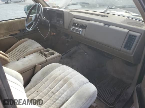 1994 GMC Sierra 1500 with VIN 2GTEK19K1R1548357, listed as a Copart auction lot 82556885 with 157,548 mi miles and Clean title. Bid and sale history available at DreamBid. Image 8.