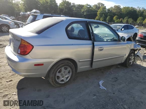 2003 Hyundai Accent GL с VIN KMHCG35C93U260712, выставлен на аукционе Copart как лот 75209844 с пробегом Не указан миль и Списание • Salvage title. История ставок и продаж доступна на DreamBid. Изображение 3.