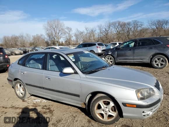 2004 Hyundai Elantra GT z VIN KMHDN56DX4U103396, wystawiony jako Copart lot #83343974 z przebiegiem 124 917 mil mil oraz Czysty tytuł • Clean title. Historia ofert i sprzedaży dostępna na DreamBid. Obrazek 4.