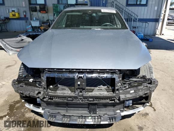 2024 BMW i4 eDrive35 with VIN WBY43AW05RFT55891, listed as a Copart auction lot 66478405 with 8,583 mi miles and Salvage title. Bid and sale history available at DreamBid. Image 5.