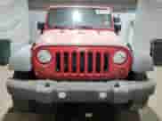 2012 Jeep Wrangler Sport with VIN 1C4AJWAG2CL135192, listed as a Copart auction lot 64013735 with 120,891 mi miles and Clean title. Bid and sale history available at DreamBid. Image 5.