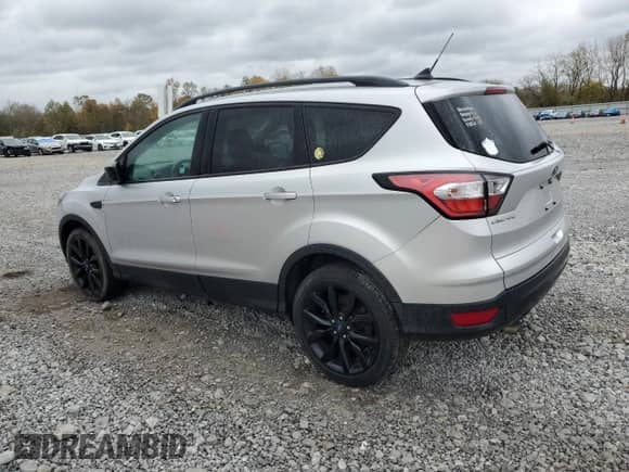 2018 Ford Escape SE z VIN 1FMCU9GD4JUB78529, wystawiony jako Copart lot #87490825 z przebiegiem 72 966 mil mil oraz Czysty tytuł • Clean title. Historia ofert i sprzedaży dostępna na DreamBid. Obrazek 2.