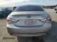 2013 Hyundai Sonata Limited z VIN KMHEC4A4XDA090209, wystawiony jako Copart lot #86869935 z przebiegiem 160 666 mil mil oraz Szkoda całkowita • Salvage title. Historia ofert i sprzedaży dostępna na DreamBid. Obrazek 6.