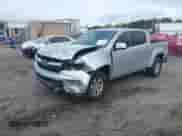 2019 Chevrolet Colorado 2WD Work Truck with VIN 1GCGSBEN3K1164686, listed as a IAAI auction lot 41943796 with 65,000 mi miles and . Bid and sale history available at DreamBid. Image 2.