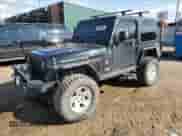 2004 Jeep Wrangler Rubicon z VIN 1J4FA69S74P737413, wystawiony jako Copart lot #83940895 z przebiegiem 241 929 mil mil oraz Szkoda całkowita • Salvage title. Historia ofert i sprzedaży dostępna na DreamBid. Obrazek 1.