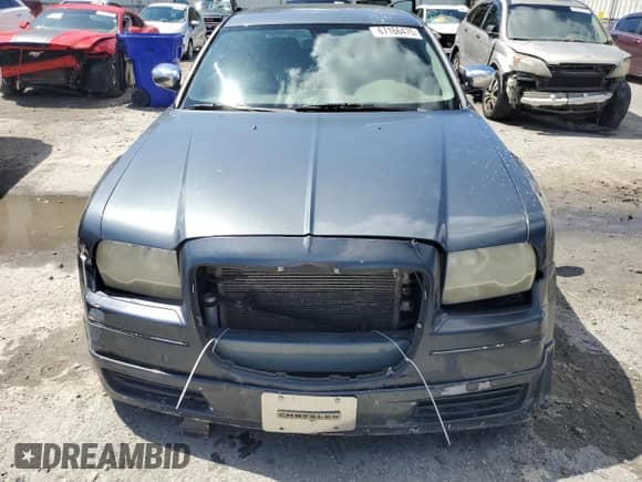 2007 Chrysler 300 with VIN 2C3KA43R07H731464, listed as a Copart auction lot 67166475 with 195,813 mi miles and Salvage title. Bid and sale history available at DreamBid. Image 5.