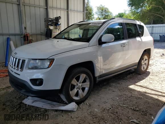 2014 Jeep Compass Latitude with VIN 1C4NJCEB9ED826084, listed as a Copart auction lot 72266434 with 103,718 mi miles and Salvage title. Bid and sale history available at DreamBid. Image 1.