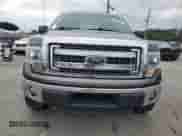 2014 Ford F-150 XLT with VIN 1FTFW1EF2EKD03028, listed as a Copart auction lot 83790445 with 174,756 mi miles and Salvage title. Bid and sale history available at DreamBid. Image 5.