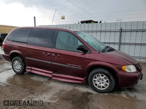 2002 Dodge Caravan Sport with VIN 2B4GP443X2R768659, listed as a Copart auction lot 65838365 with 76,735 mi miles and Clean title. Bid and sale history available at DreamBid. Image 4.