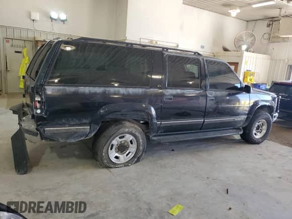 1999 Chevrolet Suburban с VIN 1GNGK26J6XJ444189, выставлен на аукционе Copart как лот 68249474 с пробегом 216 412 миль миль и Списание • Salvage title. История ставок и продаж доступна на DreamBid. Изображение 3.