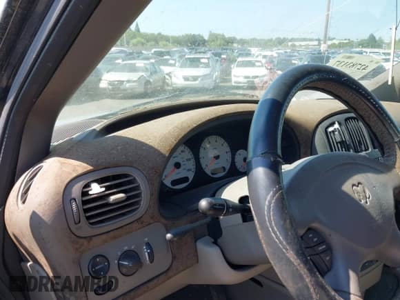 2003 Dodge Caravan ES z VIN 2D4GP54L93R283961, wystawiony jako IAAI lot #42783137 z przebiegiem Nie podano mil oraz . Historia ofert i sprzedaży dostępna na DreamBid. Obrazek 7.