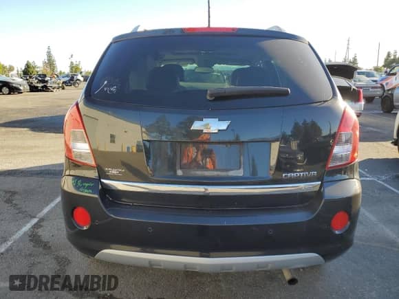 2014 Chevrolet Captiva Sport LTZ z VIN 3GNAL4EK6ES569410, wystawiony jako Copart lot #79771094 z przebiegiem 142 157 mil mil oraz Szkoda całkowita • Salvage title. Historia ofert i sprzedaży dostępna na DreamBid. Obrazek 6.