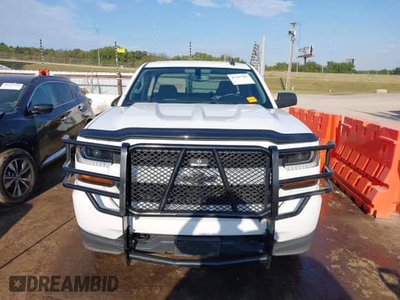 2019 Chevrolet Silverado 1500 Custom z VIN 2GCVKMEC7K1243970, wystawiony jako IAAI lot #43347102 z przebiegiem 79 556 mil mil oraz . Historia ofert i sprzedaży dostępna na DreamBid. Obrazek 12.