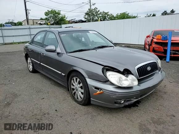 2003 Hyundai Sonata GLS z VIN KMHWF35H43A871938, wystawiony jako Copart lot #63203385 z przebiegiem 85 449 mil mil oraz Szkoda całkowita • Salvage title. Historia ofert i sprzedaży dostępna na DreamBid. Obrazek 13.