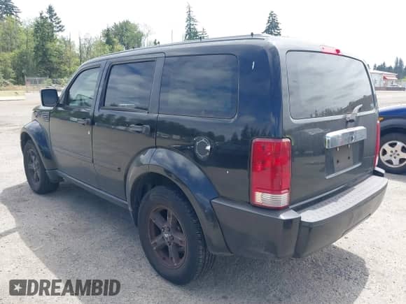 2007 Dodge Nitro SLT with VIN 1D8GU58K17W609239, listed as a IAAI auction lot 42712438 with 212,000 mi miles and . Bid and sale history available at DreamBid. Image 3.
