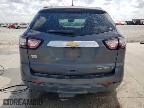 2014 Chevrolet Traverse LT с VIN 1GNKRHKD9EJ118439, выставлен на аукционе Copart как лот 84987275 с пробегом 189 912 миль миль и Списание • Salvage title. История ставок и продаж доступна на DreamBid. Изображение 6.