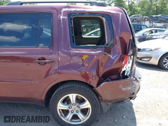 2013 Honda Pilot EX-L with VIN 5FNYF3H50DB040007, listed as a IAAI auction lot 42744260 with 143,077 mi miles and . Bid and sale history available at DreamBid. Image 6.