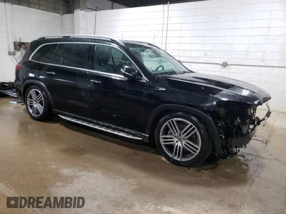 2023 Mercedes-Benz GLS 450 with VIN 4JGFF5KE9PA860252, listed as a Copart auction lot 52803445 with 48,942 mi miles and Salvage title. Bid and sale history available at DreamBid. Image 4.