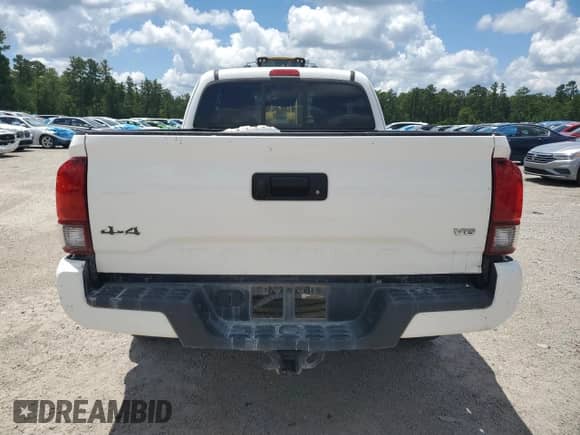 2022 Toyota Tacoma SR с VIN 3TYSZ5AN9NT062561, выставлен на аукционе Copart как лот 53581755 с пробегом 61 401 миль миль и Списание • Salvage title. История ставок и продаж доступна на DreamBid. Изображение 6.