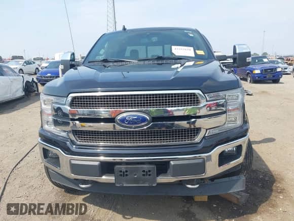 2019 Ford F-150 Lariat with VIN 1FTFW1E46KFD14388, listed as a IAAI auction lot 43253158 with 103,734 mi miles and . Bid and sale history available at DreamBid. Image 12.