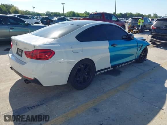 2018 BMW 4 Series 440i with VIN WBA4W7C59JAB87539, listed as a IAAI auction lot 41895024 with 73,228 mi miles and . Bid and sale history available at DreamBid. Image 4.