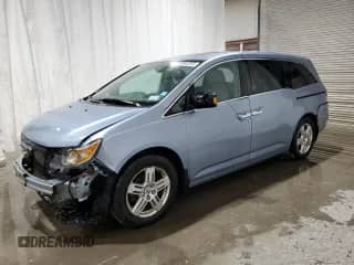 2013 Honda Odyssey Touring с VIN 5FNRL5H90DB044358, выставлен на аукционе Copart как лот 83942565 с пробегом 196 999 миль миль и Списание • Salvage title. История ставок и продаж доступна на DreamBid. Изображение 1.