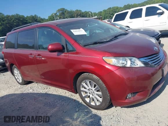 2012 Toyota Sienna XLE with VIN 5TDDK3DC7CS033189, listed as a IAAI auction lot 42814115 with 260,566 mi miles and . Bid and sale history available at DreamBid. Image 13.