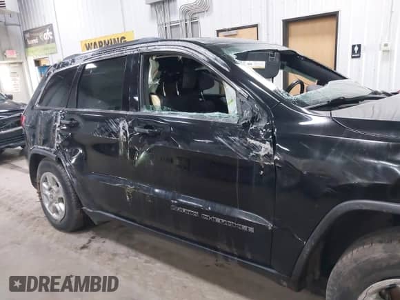 2017 Jeep Grand Cherokee Laredo z VIN 1C4RJFAG2HC625111, wystawiony jako IAAI lot #42044571 z przebiegiem 148 533 mil mil oraz . Historia ofert i sprzedaży dostępna na DreamBid. Obrazek 6.