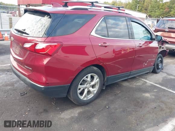 2021 Chevrolet Equinox Premier z VIN 2GNAXNEV1M6103272, wystawiony jako IAAI lot #43397887 z przebiegiem 80 967 mil mil oraz . Historia ofert i sprzedaży dostępna na DreamBid. Obrazek 4.