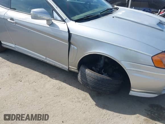 2003 Hyundai Tiburon GT с VIN KMHHN65F93U058914, выставлен на аукционе IAAI как лот 41583584 с пробегом 189 671 миль миль и . История ставок и продаж доступна на DreamBid. Изображение 12.
